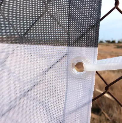 lona-impresa-microperforada-mesh-2 Imagen de los ojales de una lona impresa microperforada